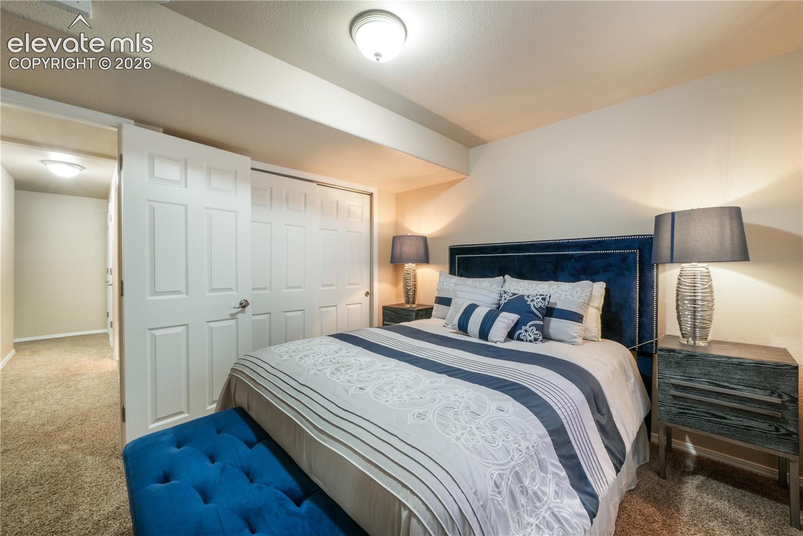 Basement Bedroom with Barn Door connecting to Second Basement Bedroom 