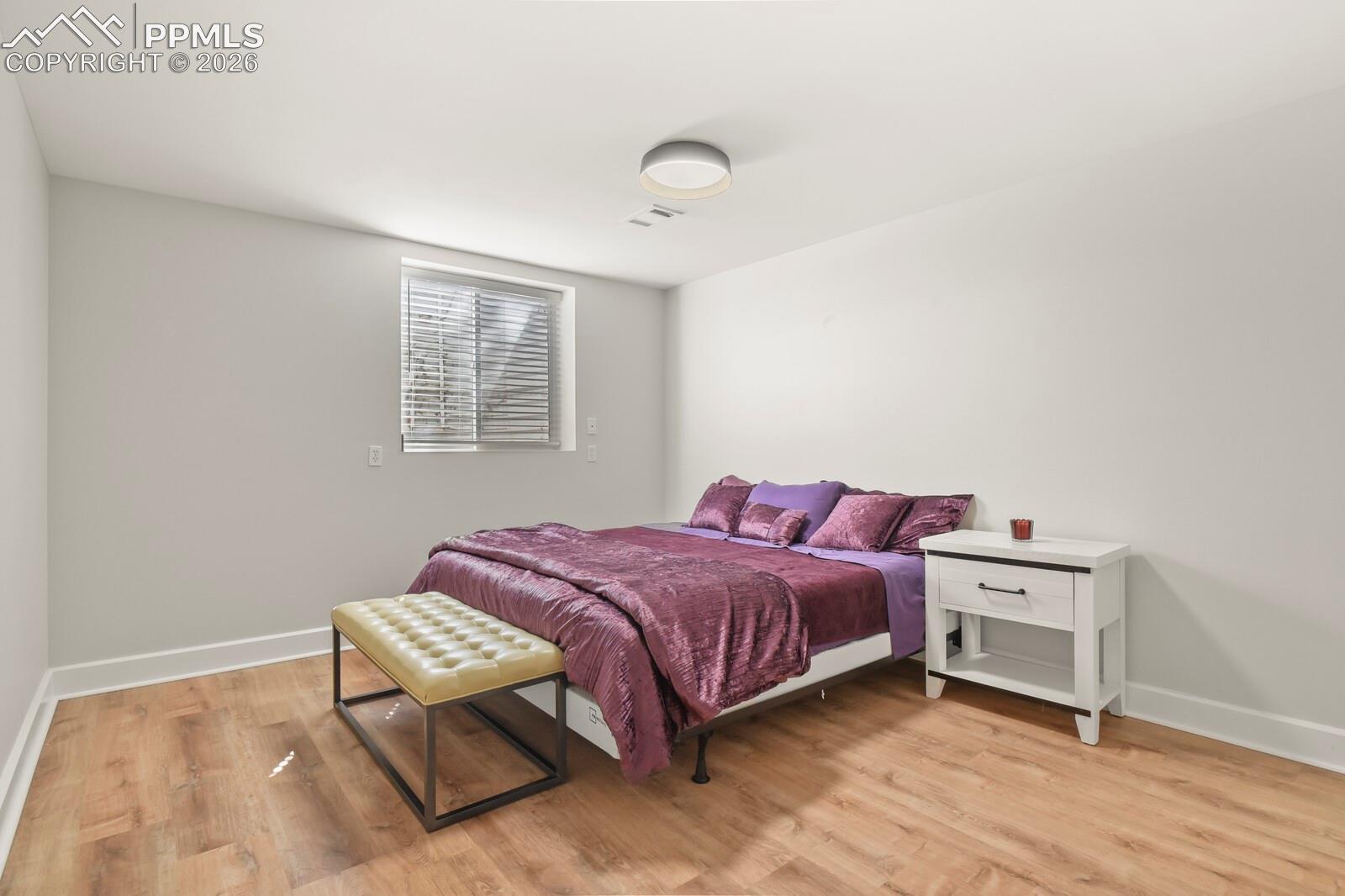 Basement bedroom with closet and egress window