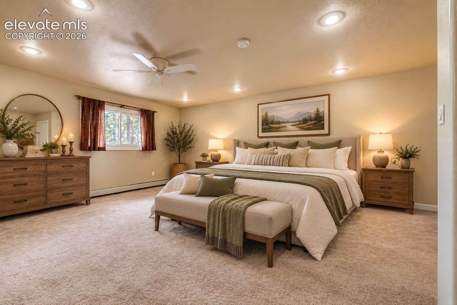 Recessed ceiling lighting, ceiling fan, carpet flooring, window with natural light, and baseboard heating