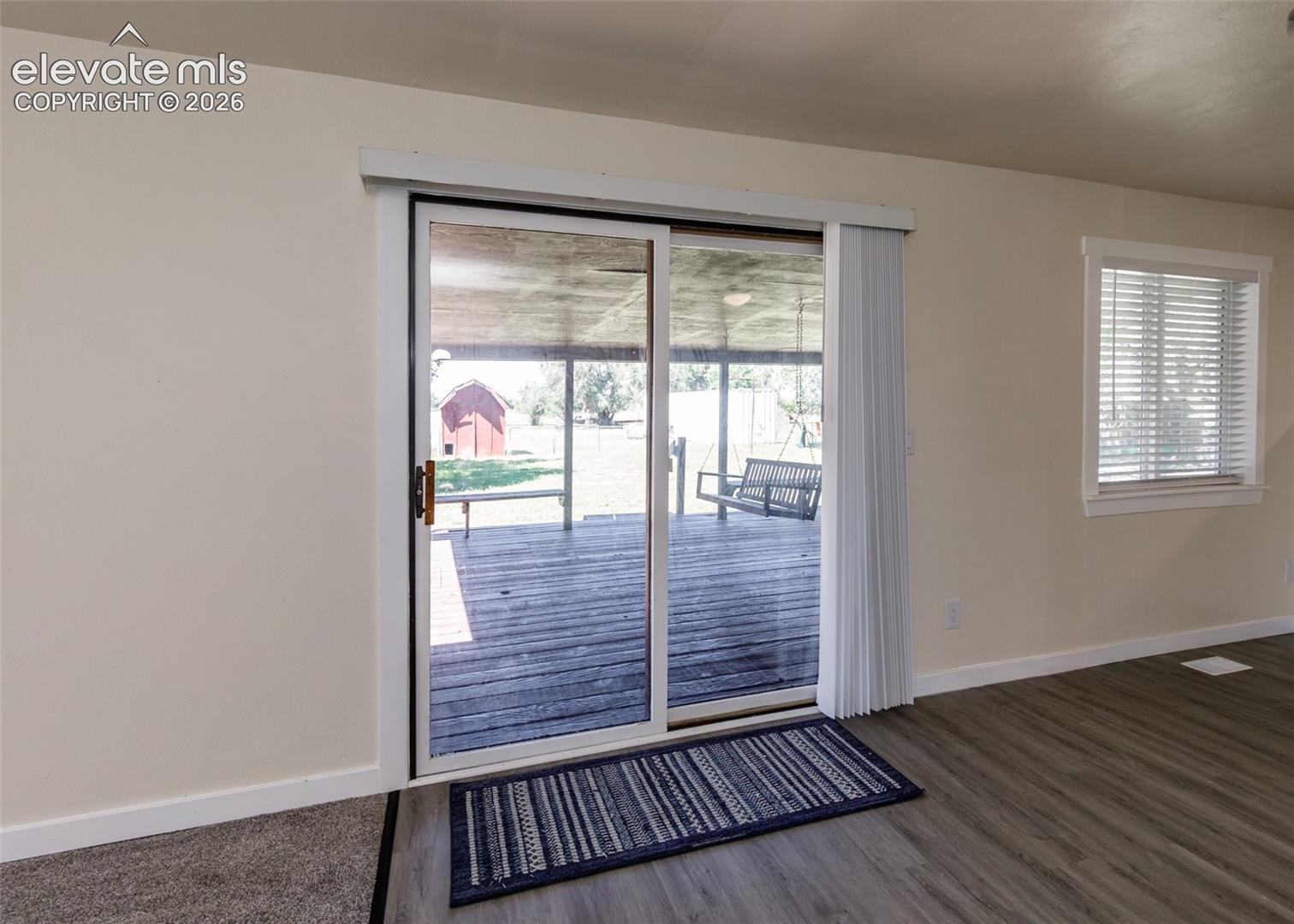 Sliding glass door from Dining Room to covered deck