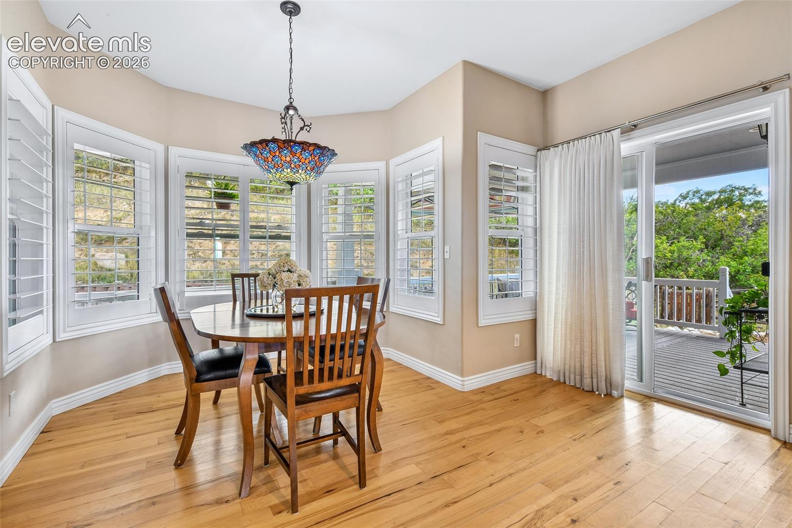 Dining bay with windows to view the wildlife, and walkout to get the bbq off of the grill!