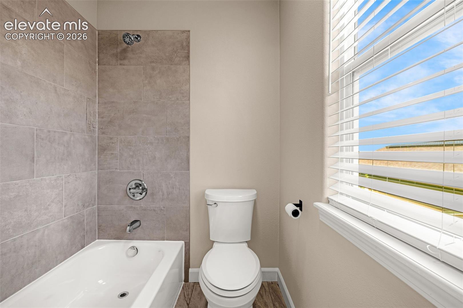 Full Bathroom with separate shower/tub and toilet.  