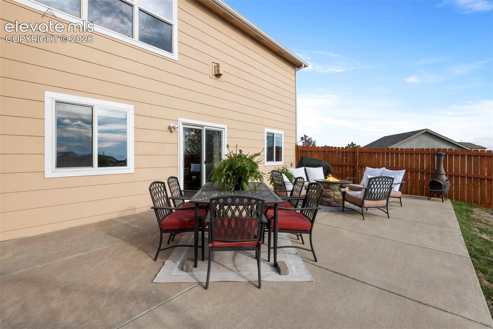 Large Concrete Patio with Privacy Fencing