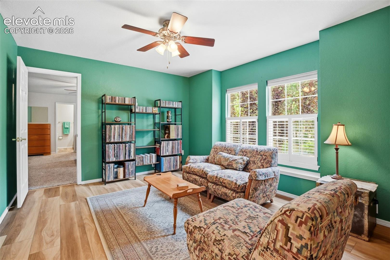Upstairs sitting room (originally a bedroom) leads to the upstairs secondary suite.