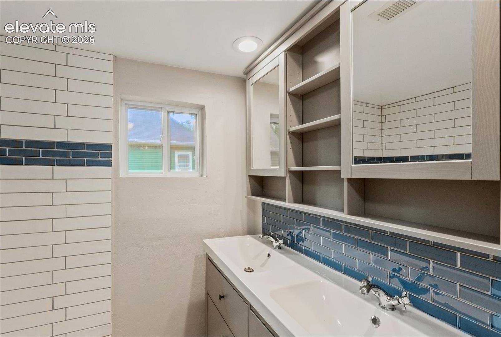 The bathroom has enough space for a double vanity