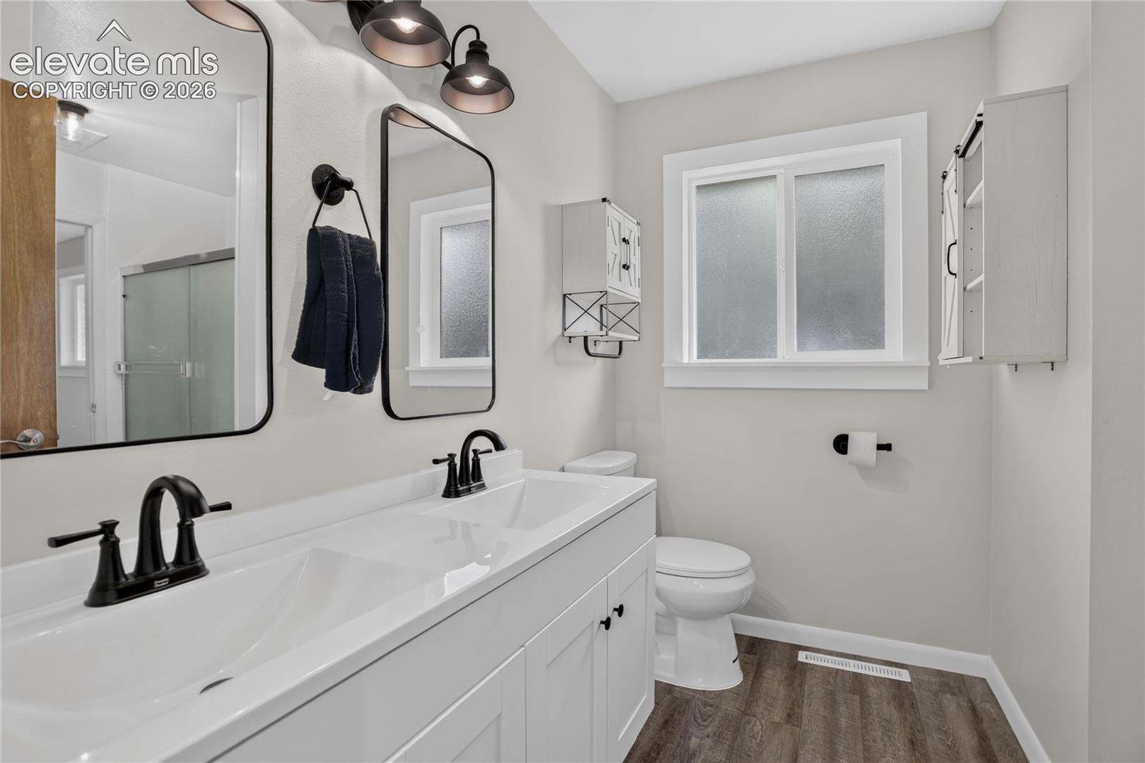 Updated primary bath w/ dual sink vanity