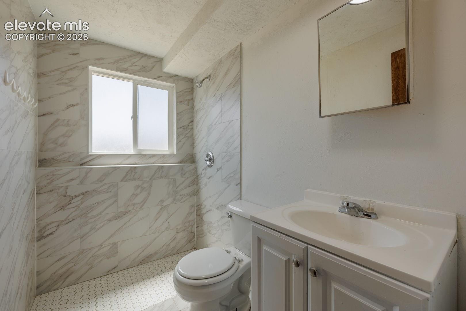 remodeled 3/4 bath near 3rd bedroom and familyroom.