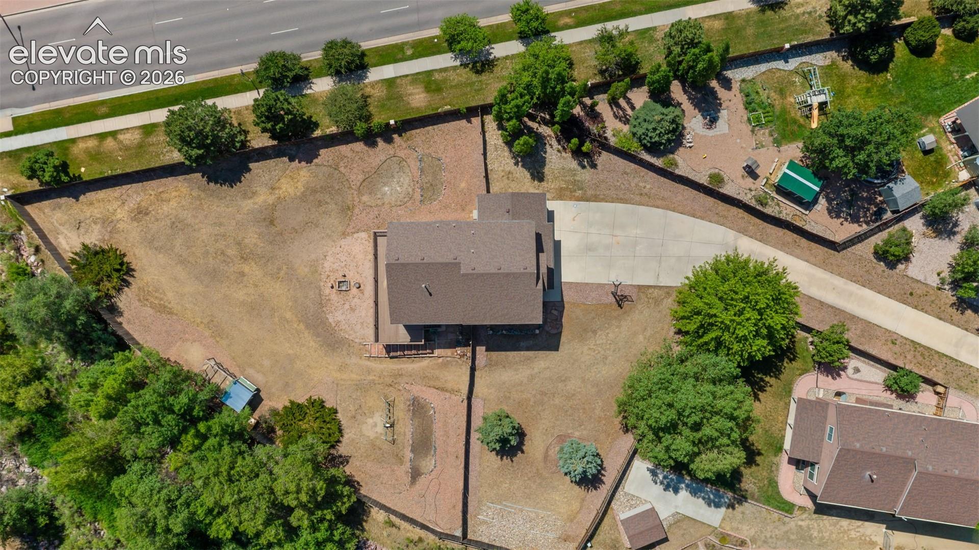 Overview of the lot at the end of a cul-de-sac.  Plenty of room for parking an RV or other toys!