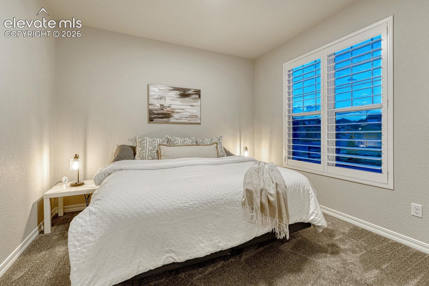 Main level bedroom off kitchen.