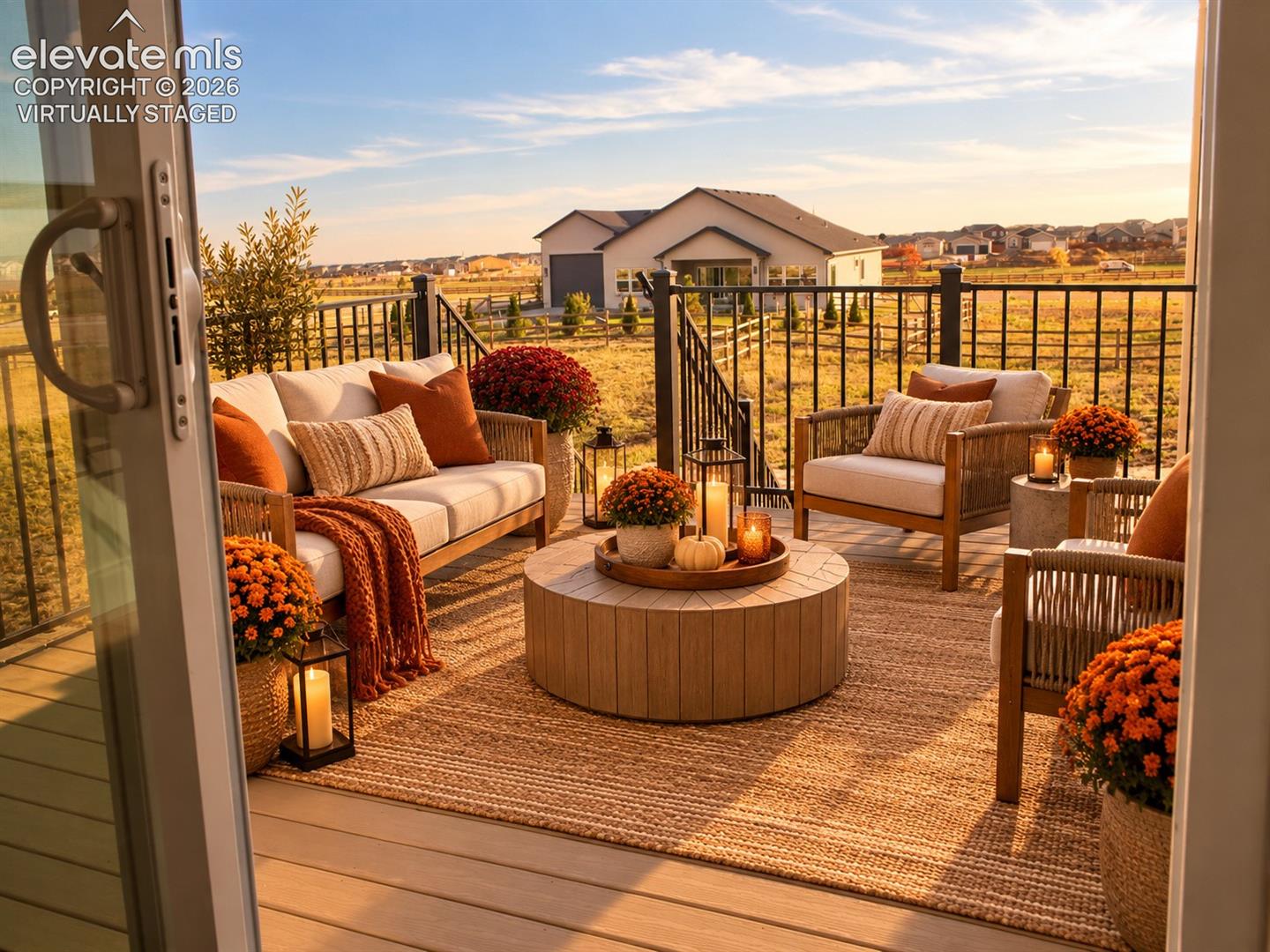 Virtually staged Expansive outdoor deck with composite decking and black metal railing