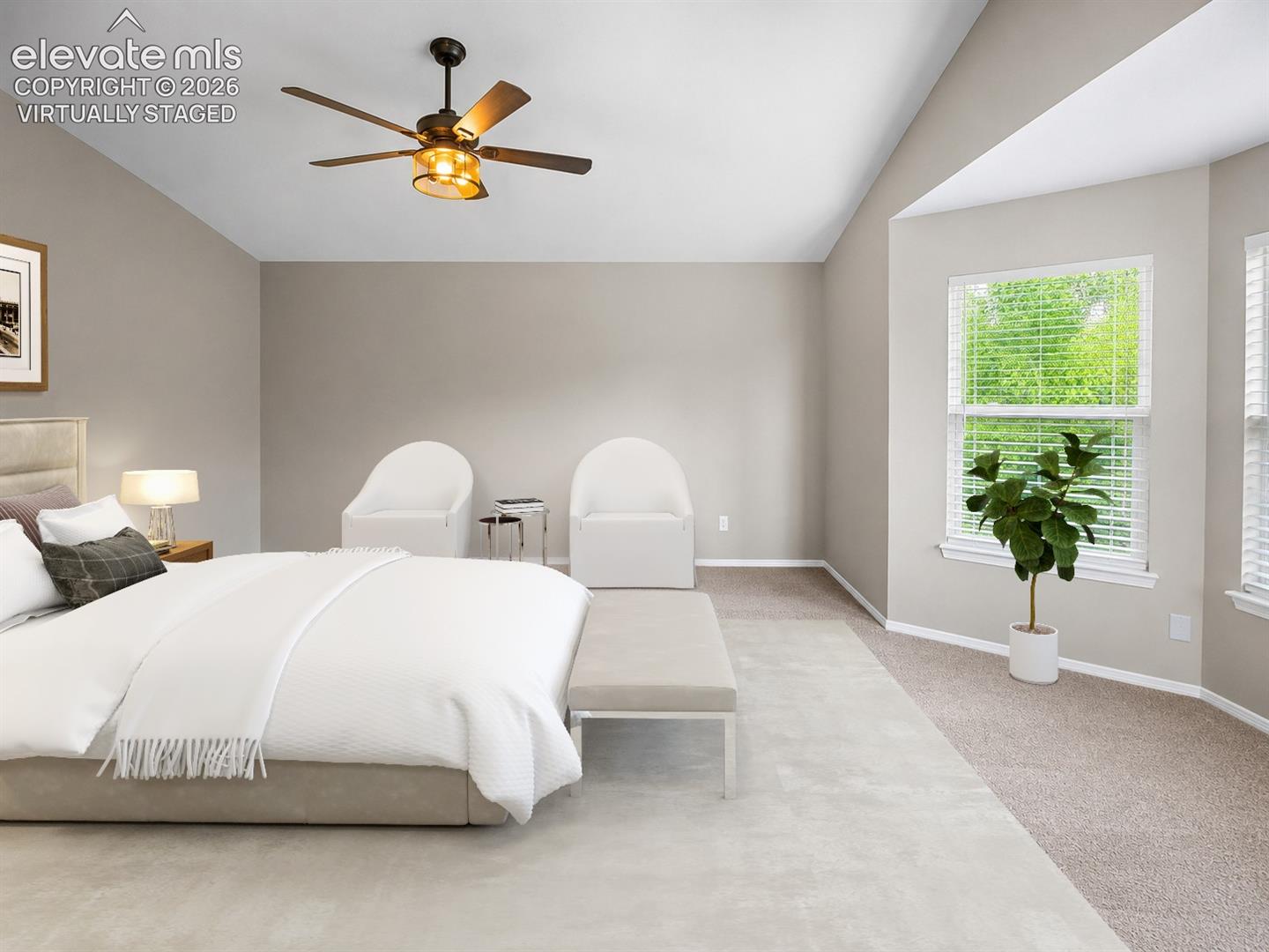 Vaulted ceiling with a ceiling fan, bay window, and carpeted flooring - virtually staged