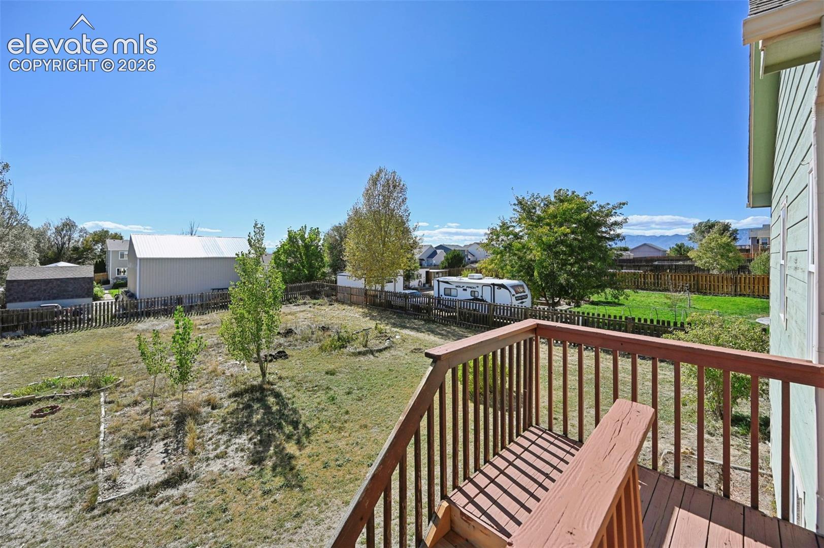Beautiful back deck with mountain views overlooking wide open space