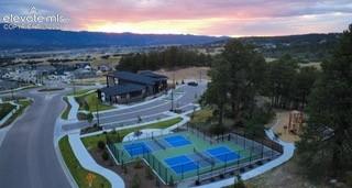 Home Place Ranch community center, playground and courts at sunset