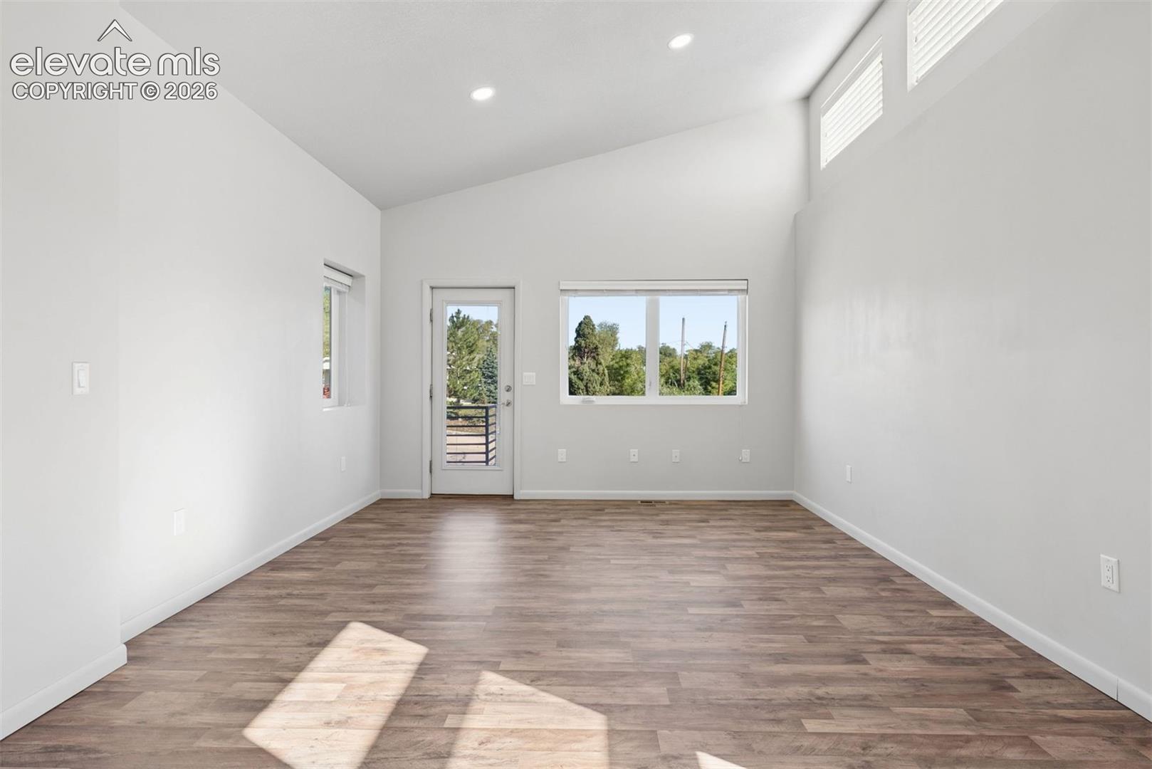 The front bedroom has LVP flooring and a separate entrance