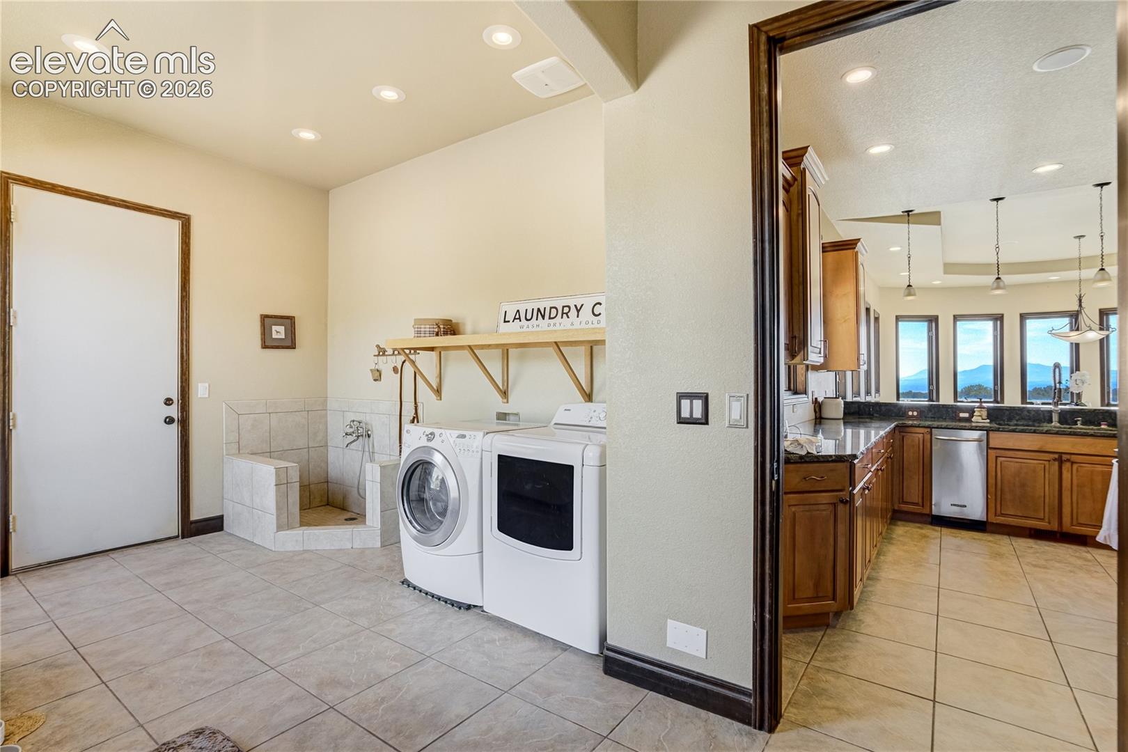 Also has walk in pantry and dog washing station, right off garage