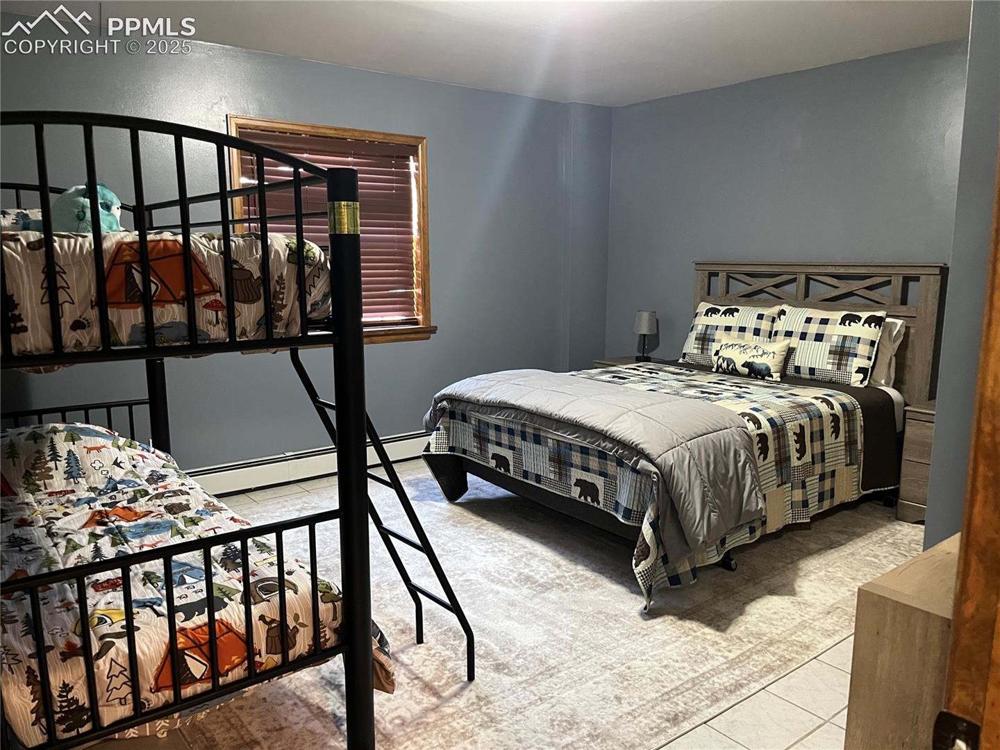 One of the 2 lower bedrooms.