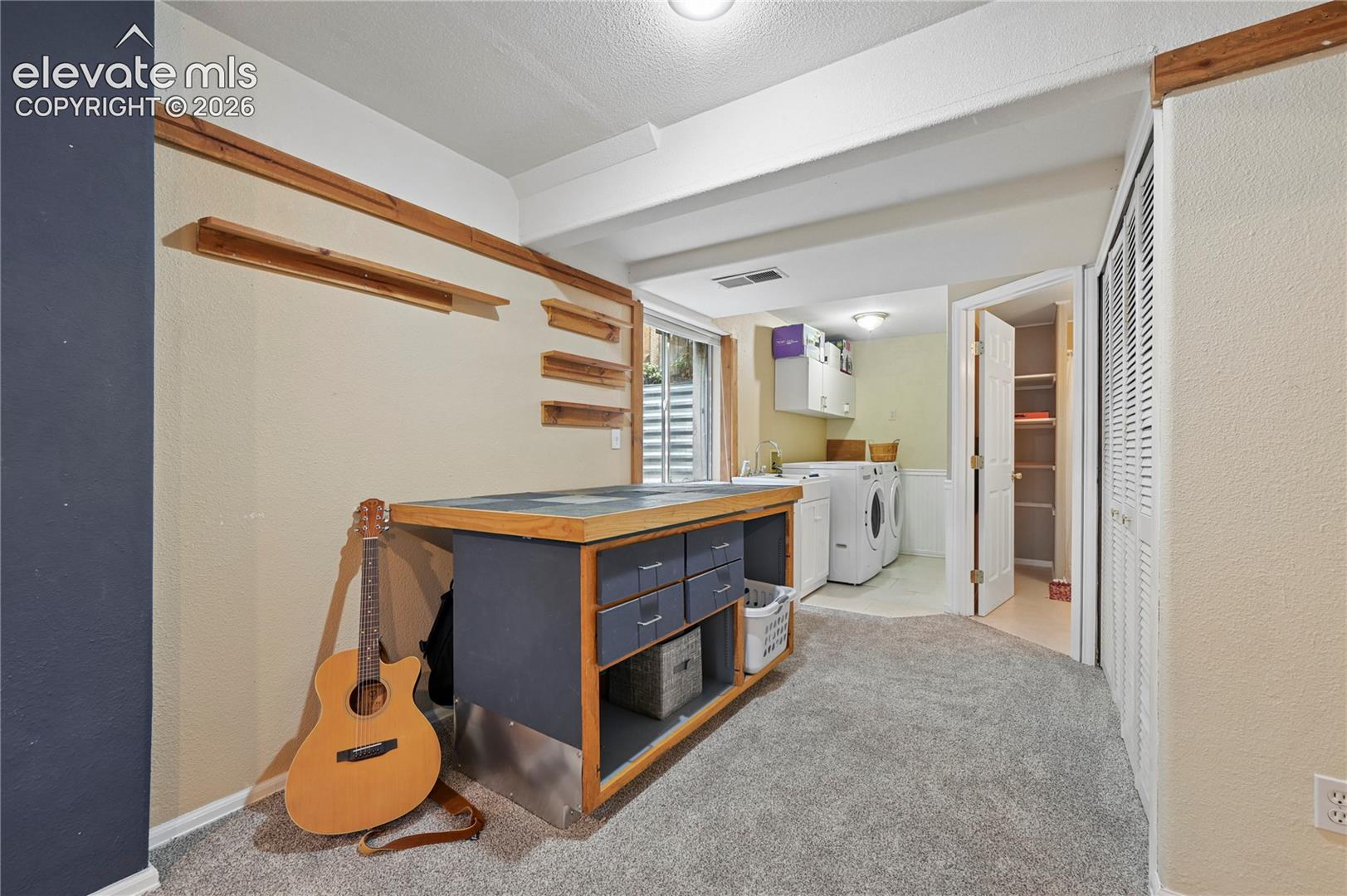 Workbench or drafting desk in the large basement space
