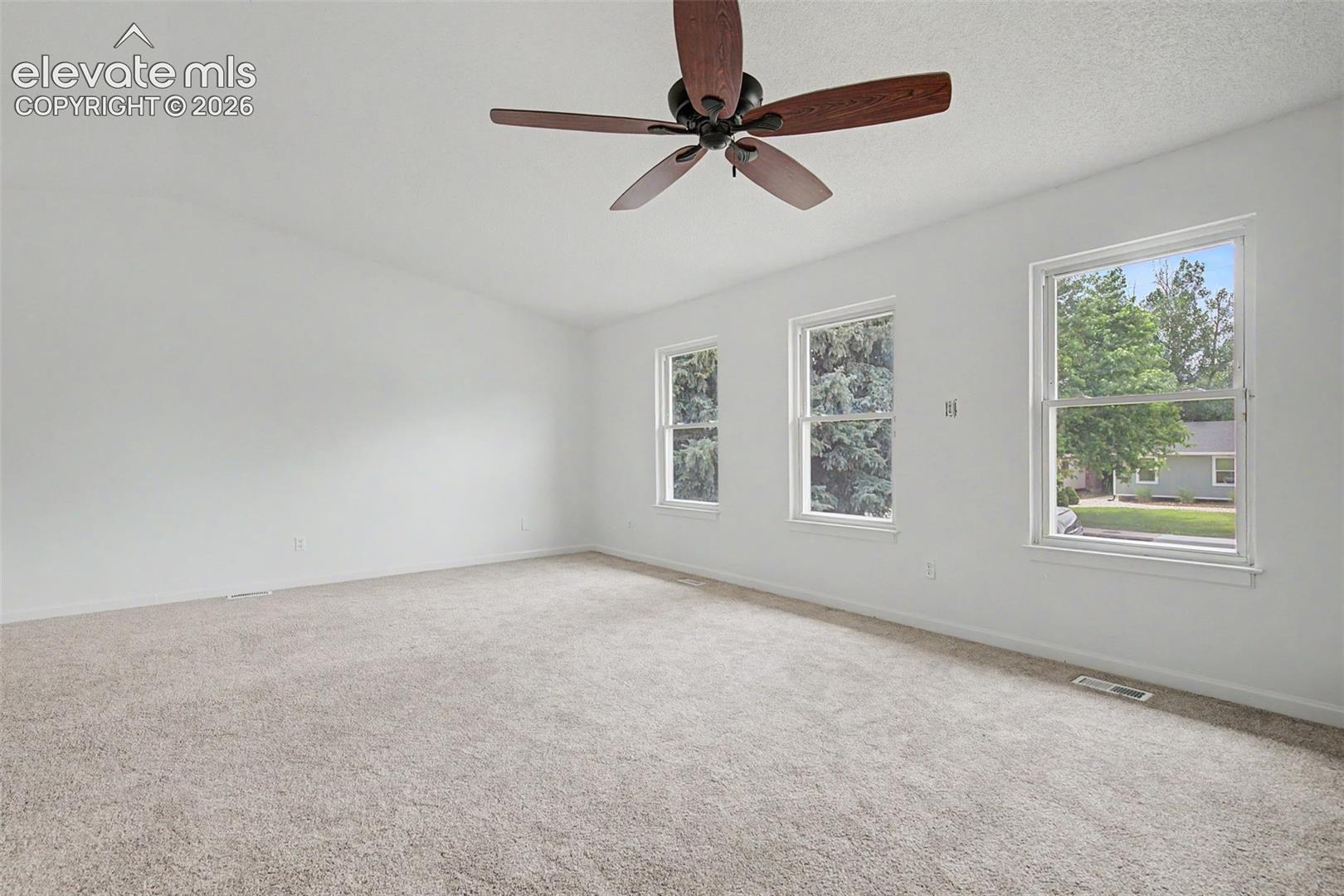 Large Living Room with Vaulted Ceilings  to Accommodate Family Gatherings