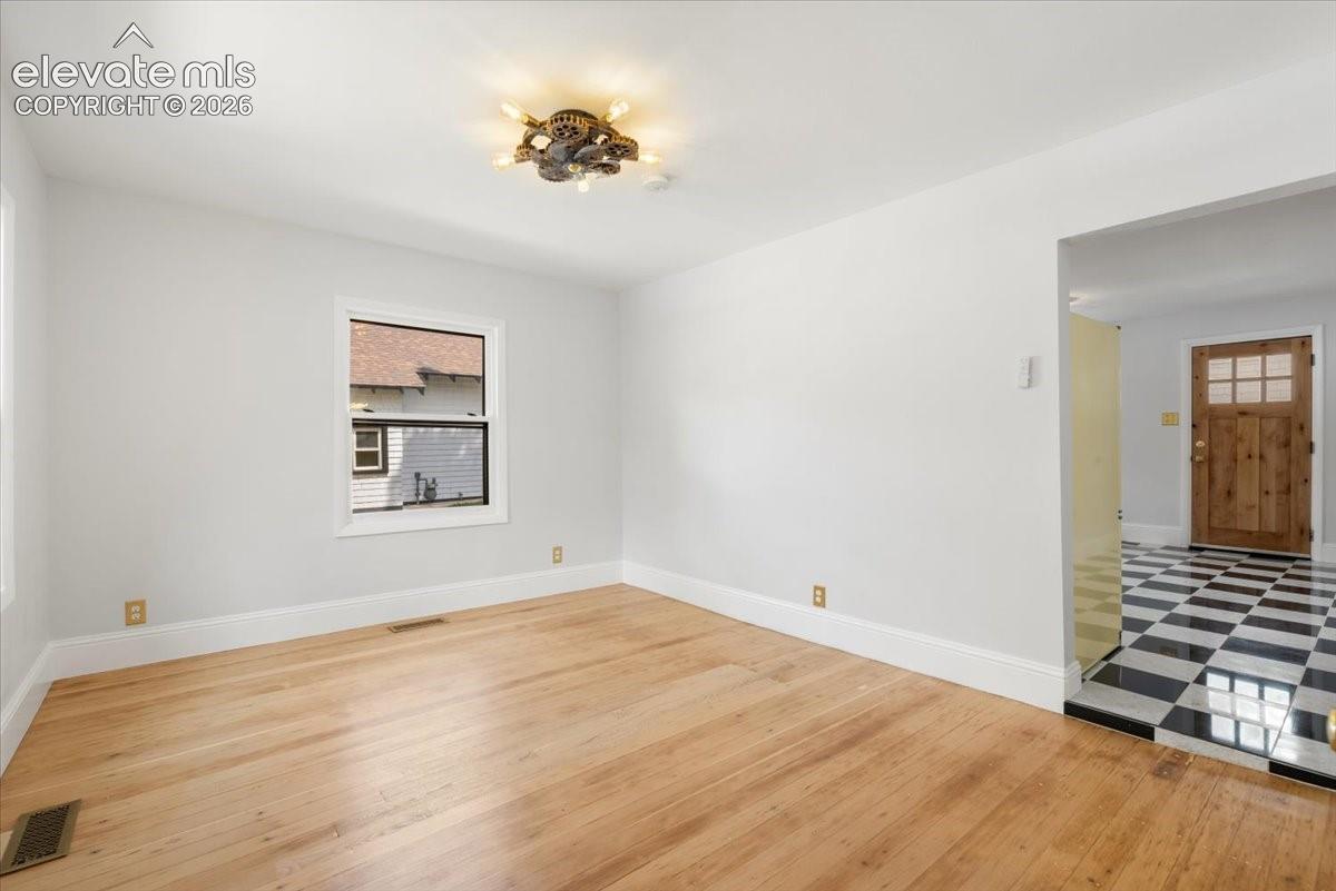 Living room leads to kitchen