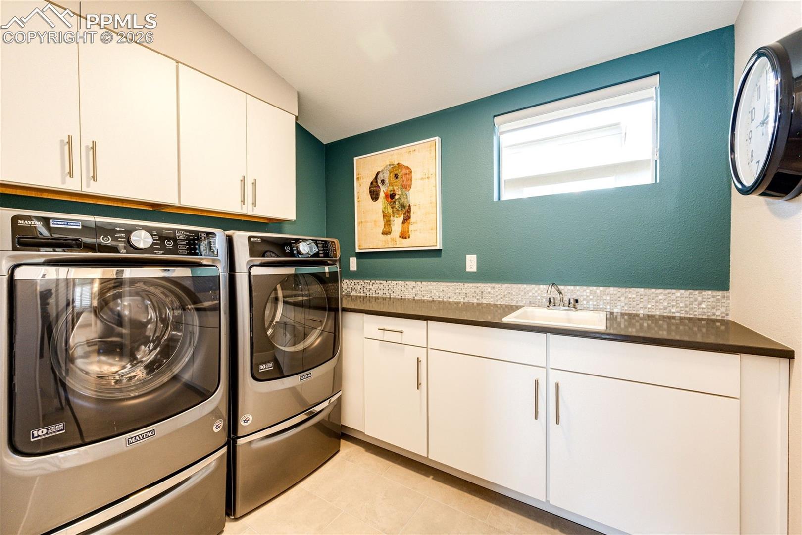High End Maytag clothes Washer and Dryer Stay! Loads of cabinets and sink
