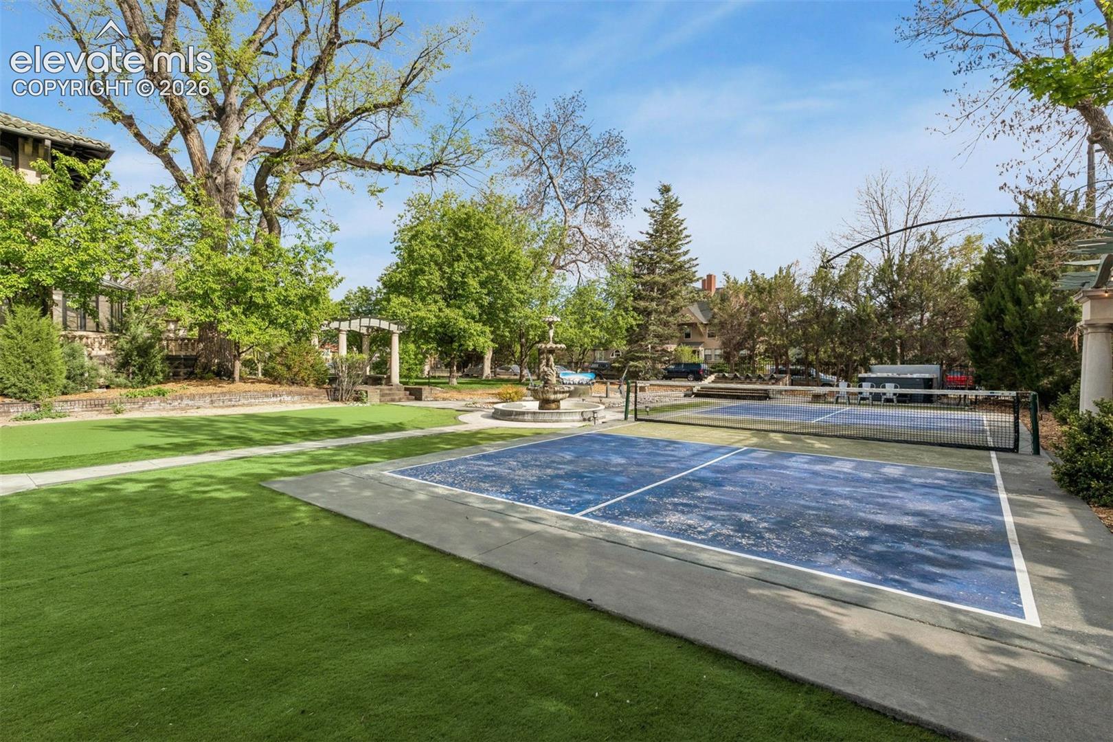 Large putting green and pickleball court.