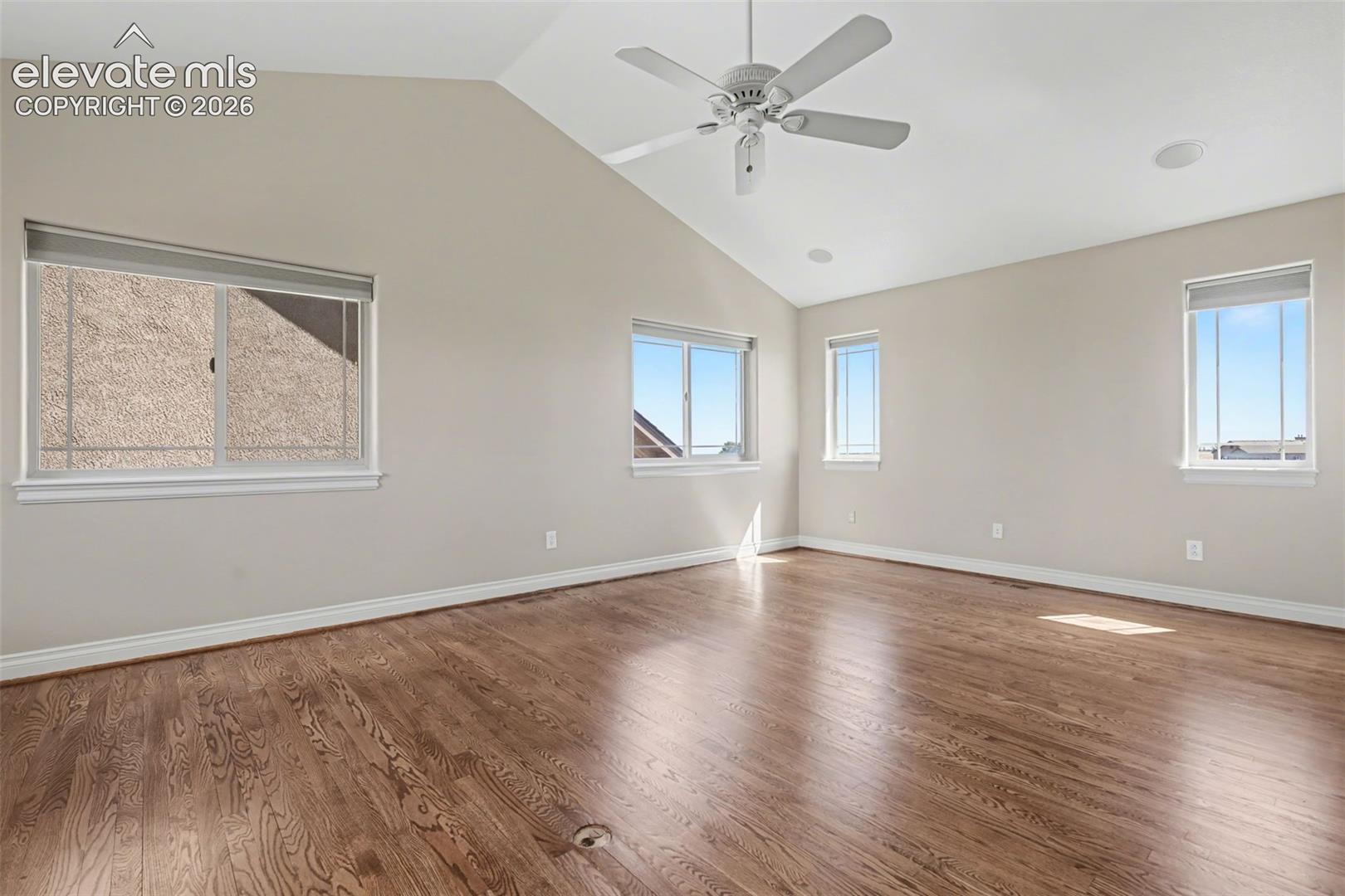 Primary Bedroom w/Fireplace, Balcony and 5-Piece Walk-in Bath