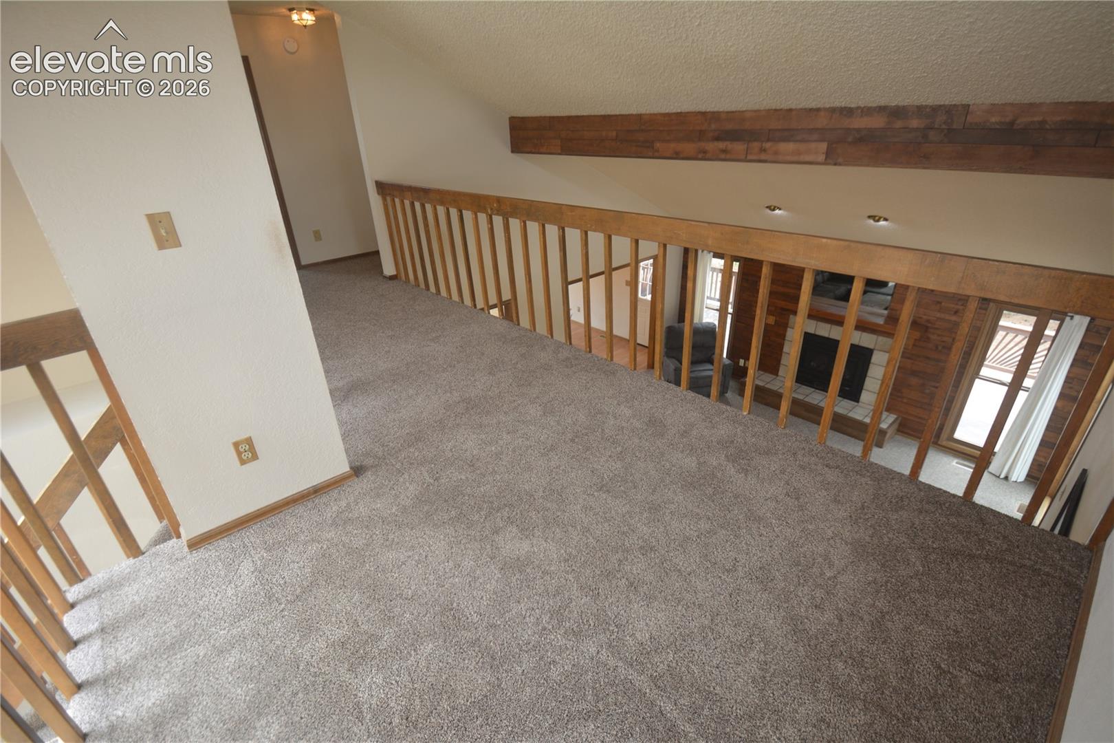 loft looking toward fireplace