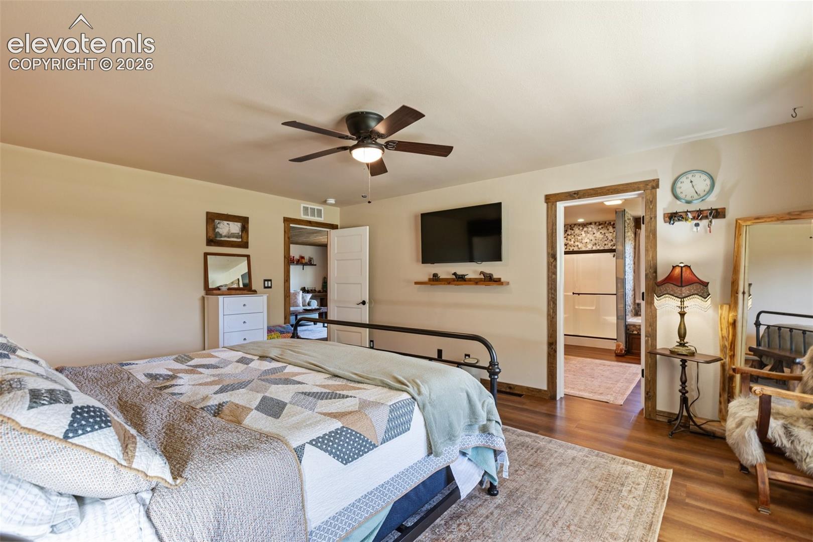 Guest bedroom with attached ensuite bath.
