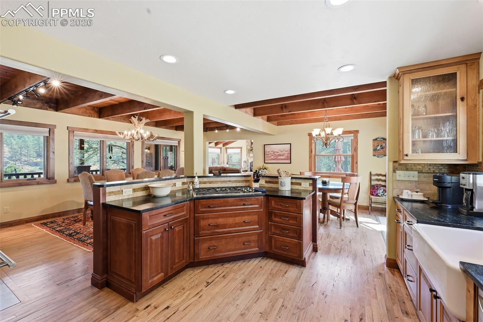Perfectly placed island offers breakfast bar seating, and creates the ideal place to gather while entertaining. 