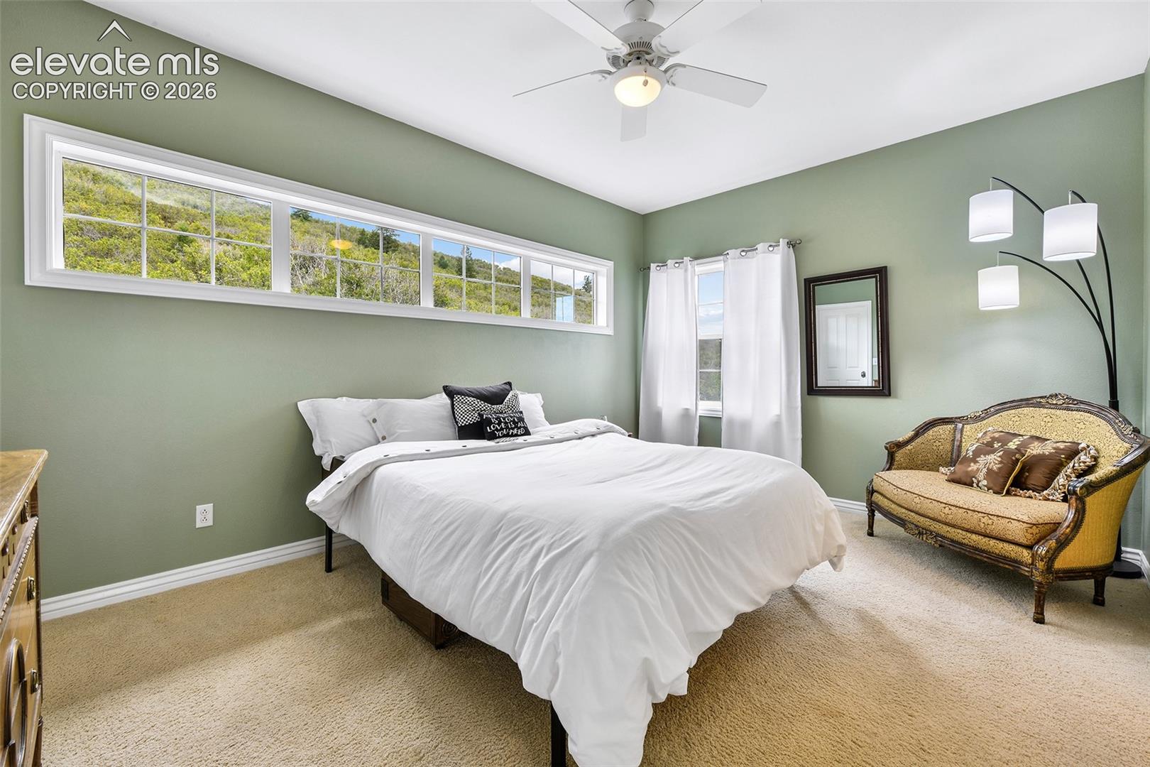 Second upper bedroom with mountain views, walk-in closet private vanity and access to Jack-n-Jill bath