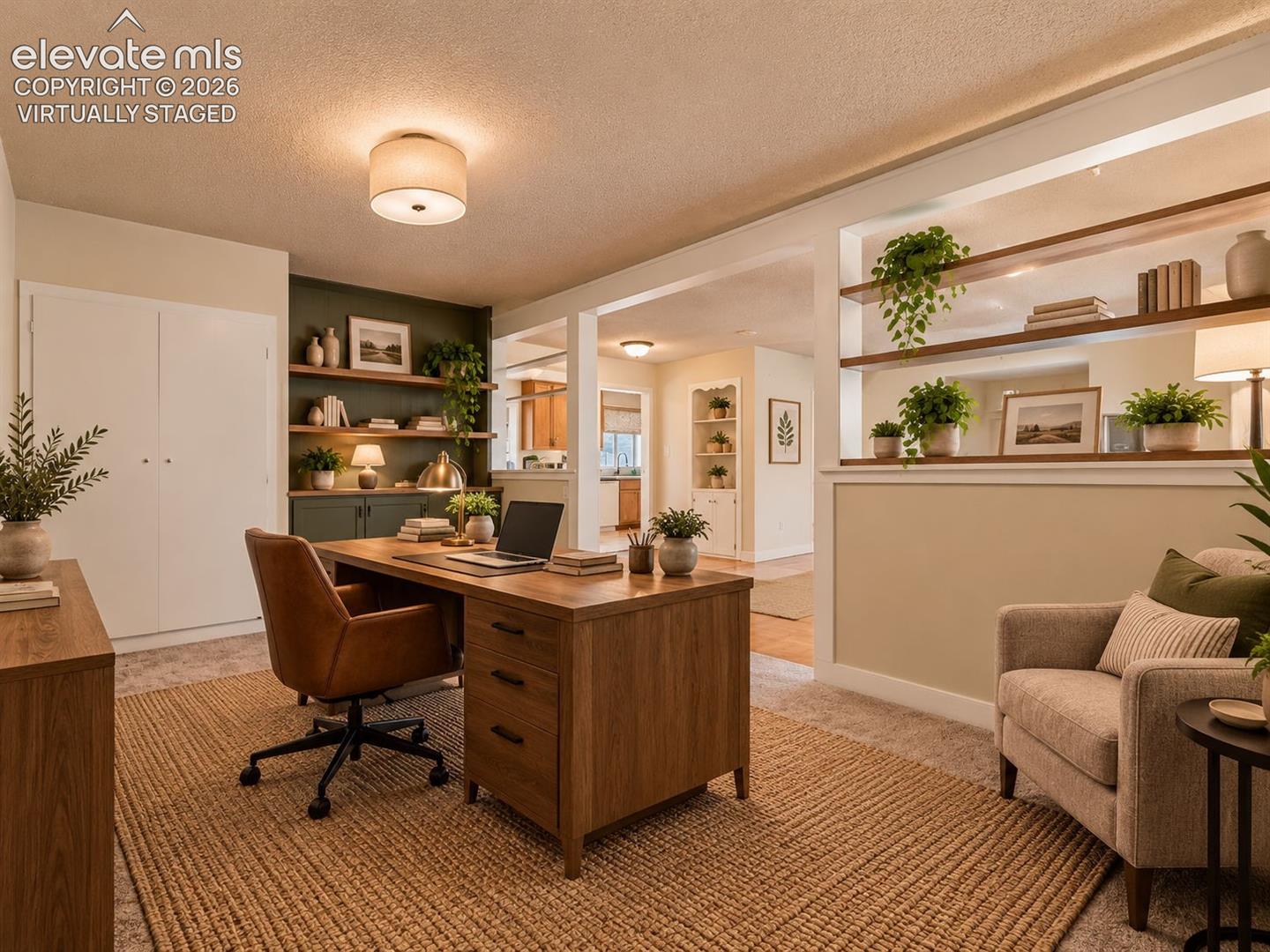 (Virtually Staged)
Flexible bonus room showcased as a comfortable home office with a dedicated workspace, seating area, and built-in shelving. Virtually staged.