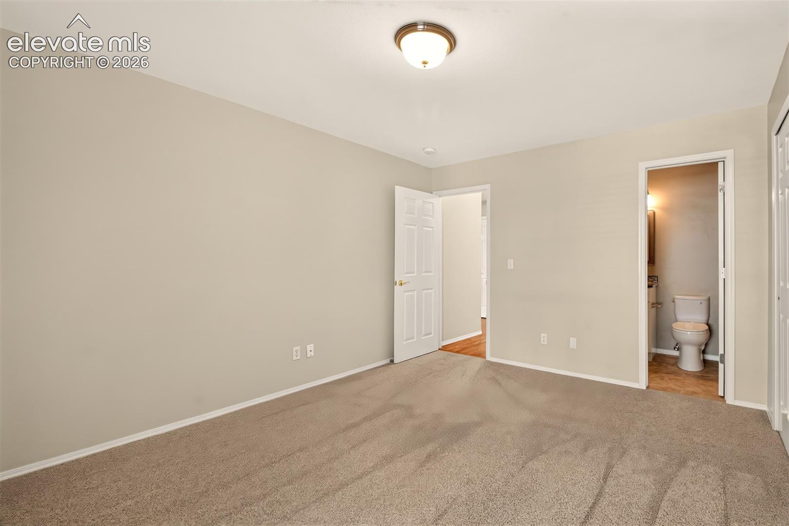 Main Level Bedroom, Bath Attached With Access From The Hall and Bedroom