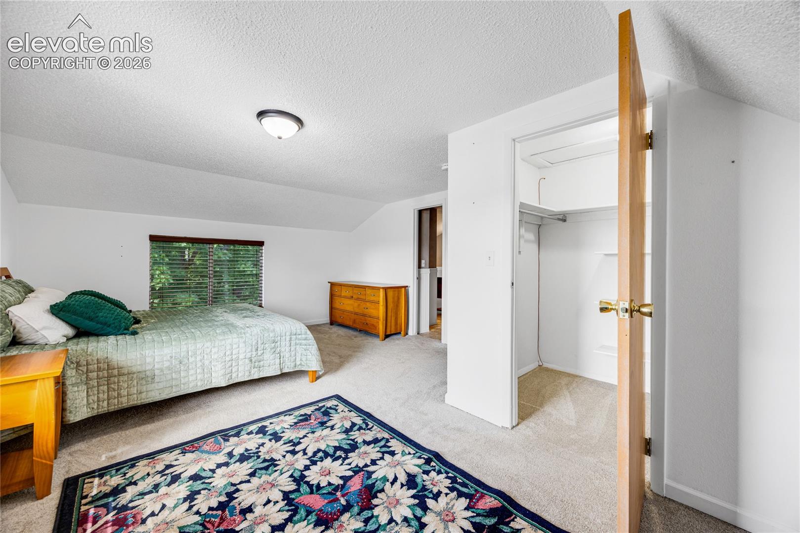 Large walk-in closet in the primary bedroom