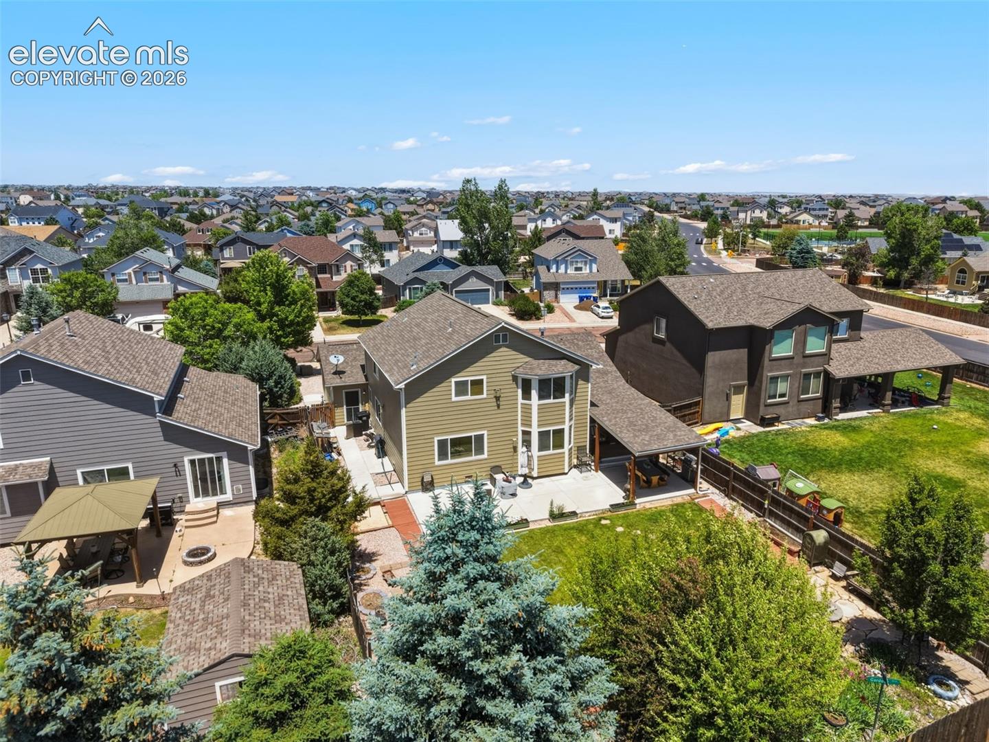 Generous Fenced Lot with Patio, Lawn & Mature Landscaping