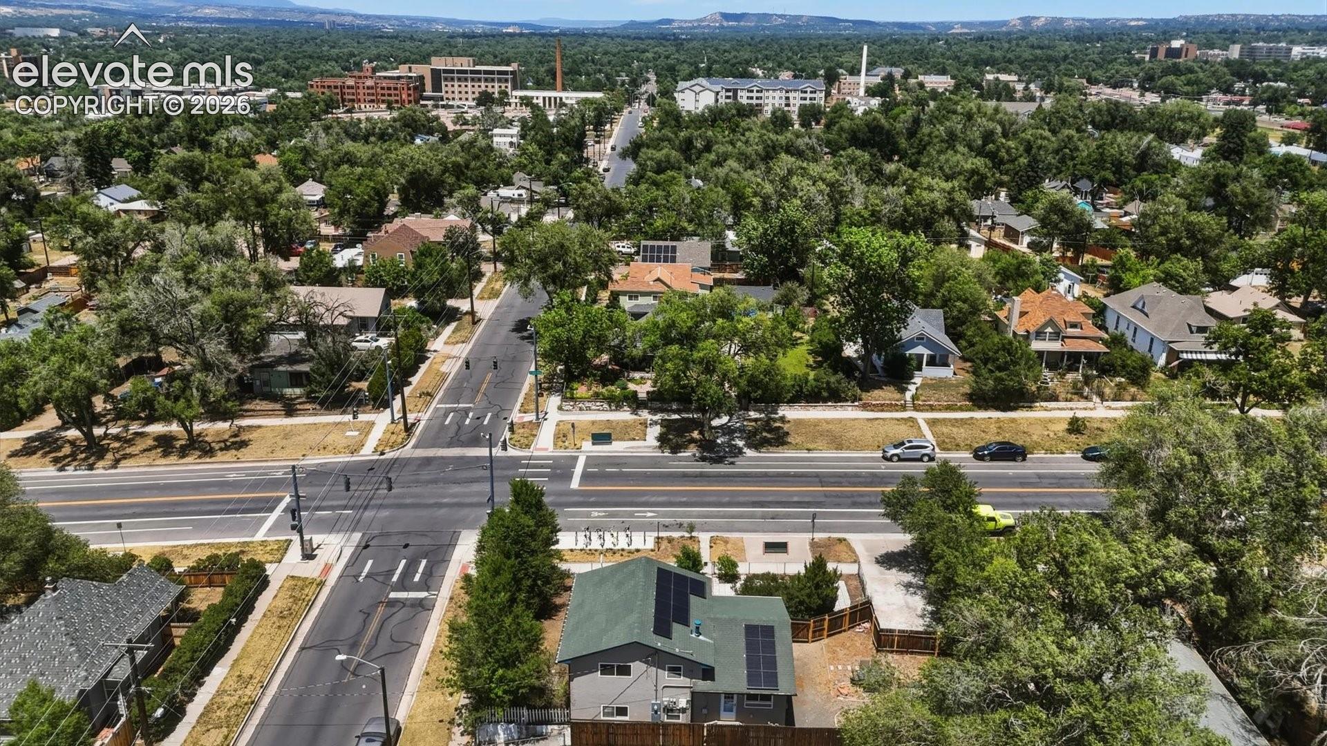 Rear aerial view of home and lot.