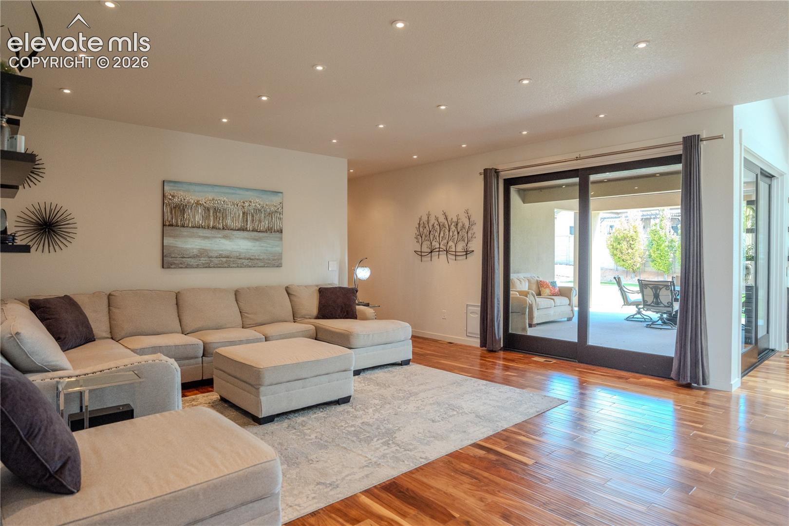 The full corner glass doors gives you the feeling of being outside plus gives you more room for entertaining.