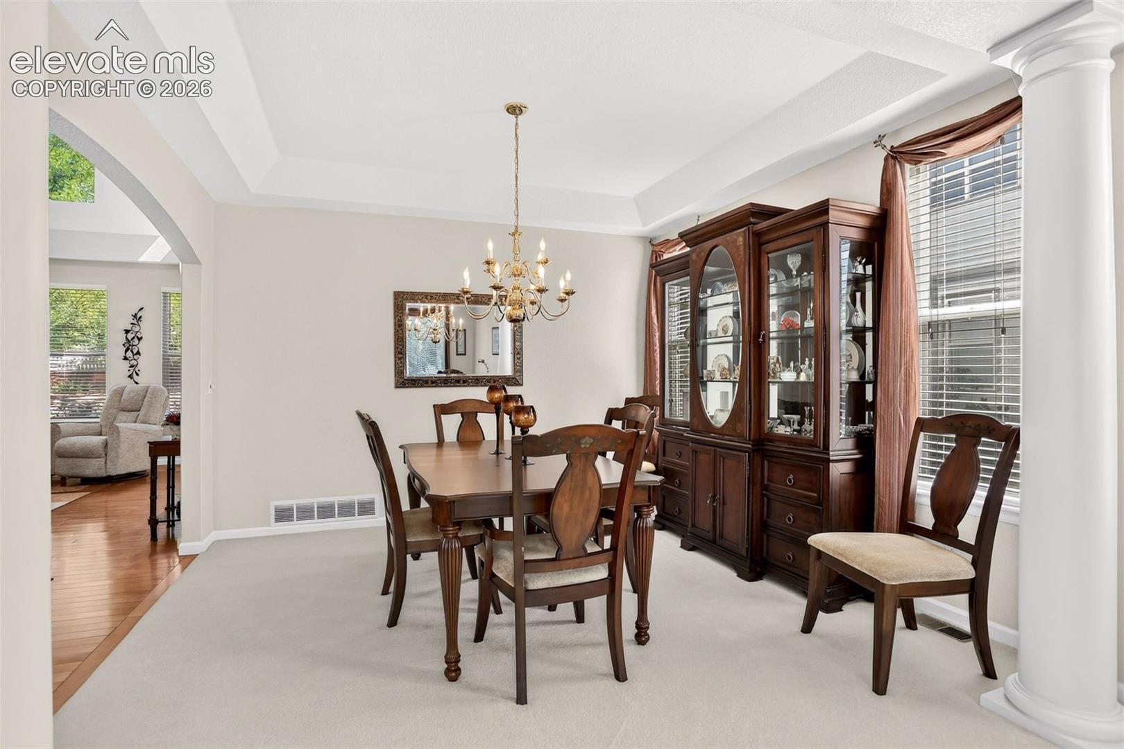 Tray ceiling with a decorative chandelier
