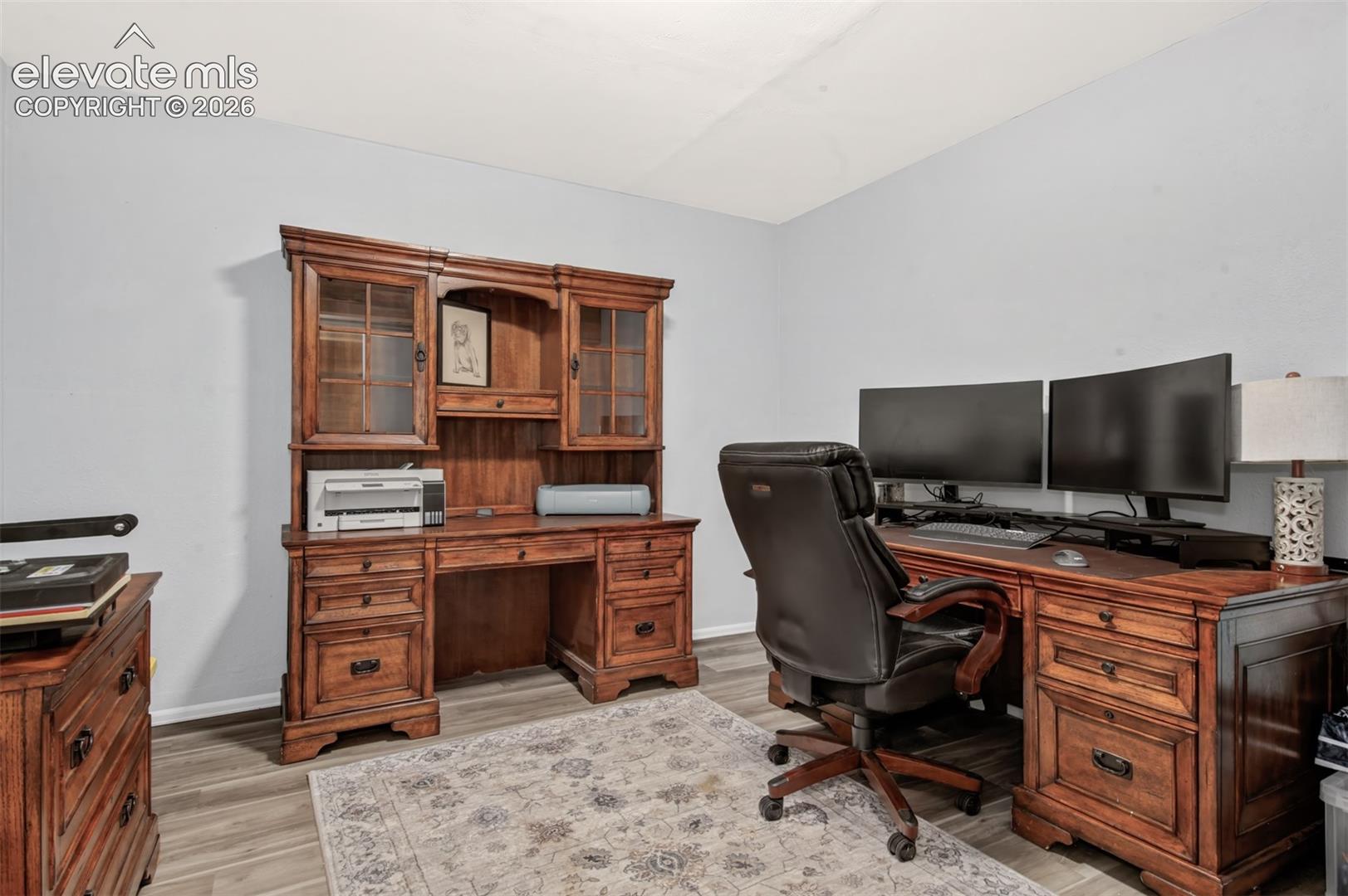 Wood-finish flooring throughout
