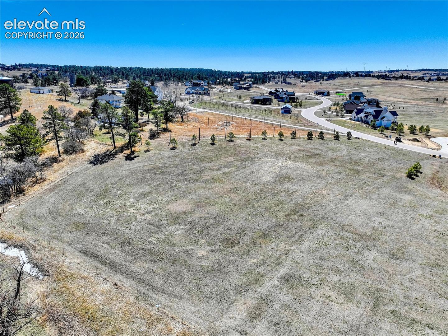 This lot is positioned adjacent to the historic 1912 homestead facing East .