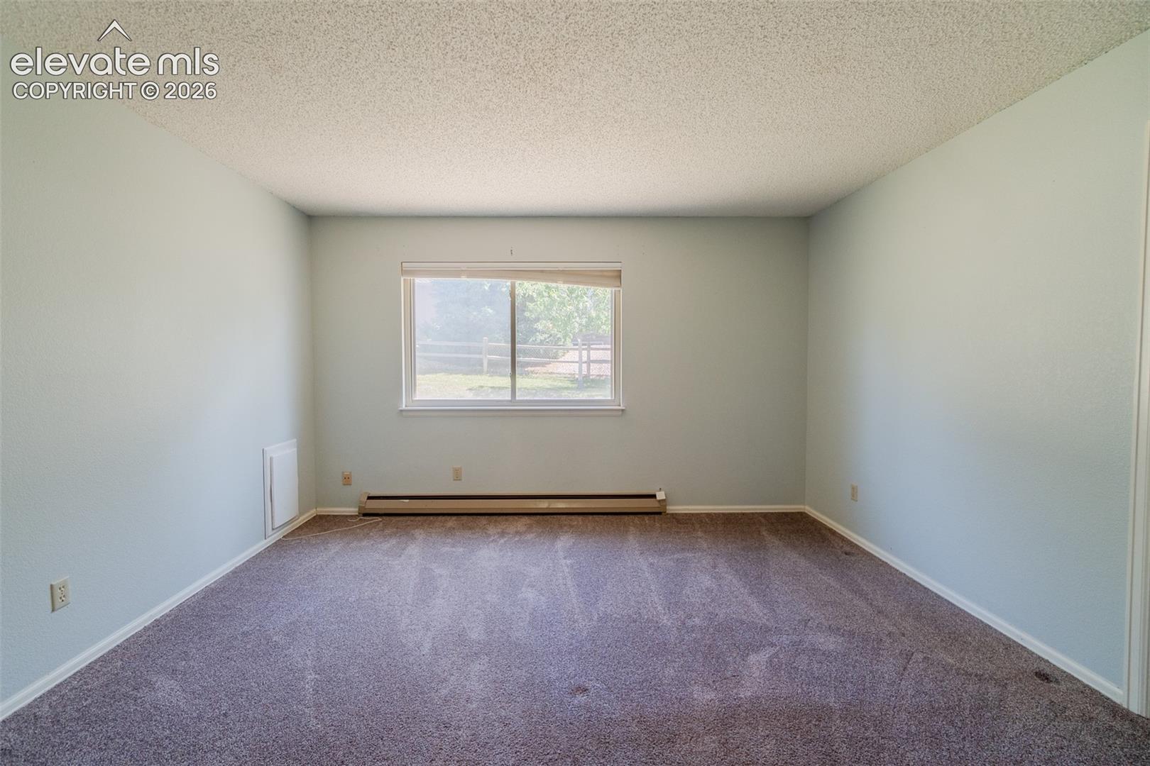 Main level Bedroom with doggy door