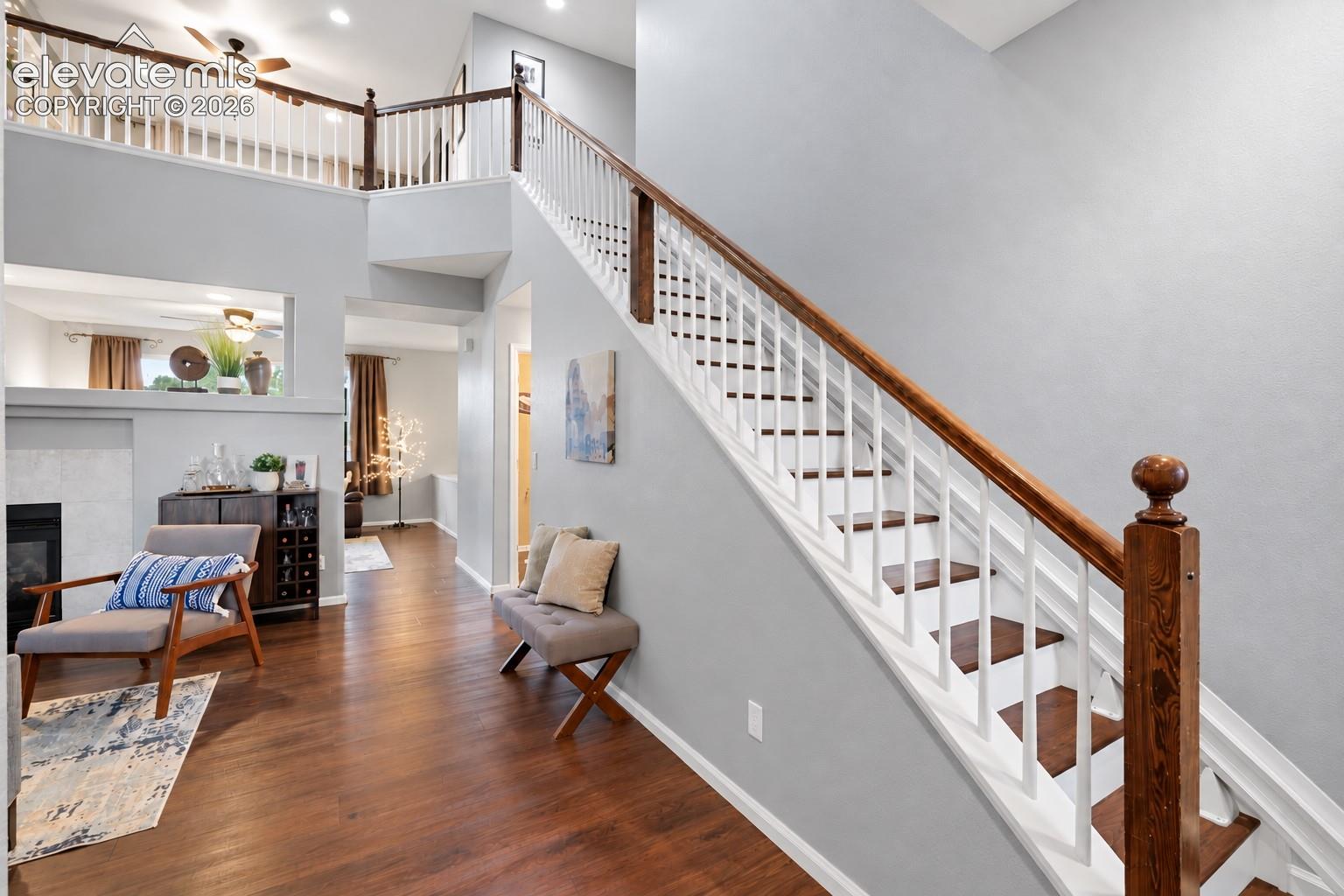 Vaulted ceilings and the open staircase give the home an airy sense of space from the moment you enter.
