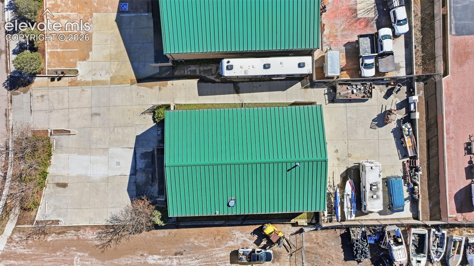 Aerial: 0.37-acre site with front and rear access, parking, and operational flexibility