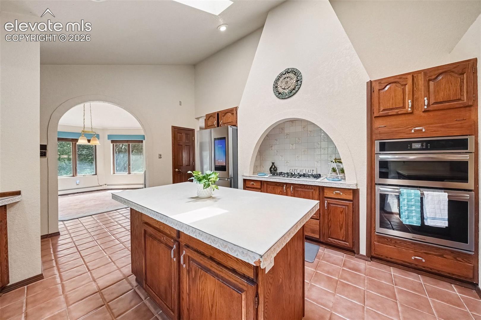 Highlights include a multifunction built-in self-cleaning oven with 15 cooking modes, microwave, gas cooktop, and Samsung Smart refrigerator with Wi-Fi, built-in camera, and YouTube access