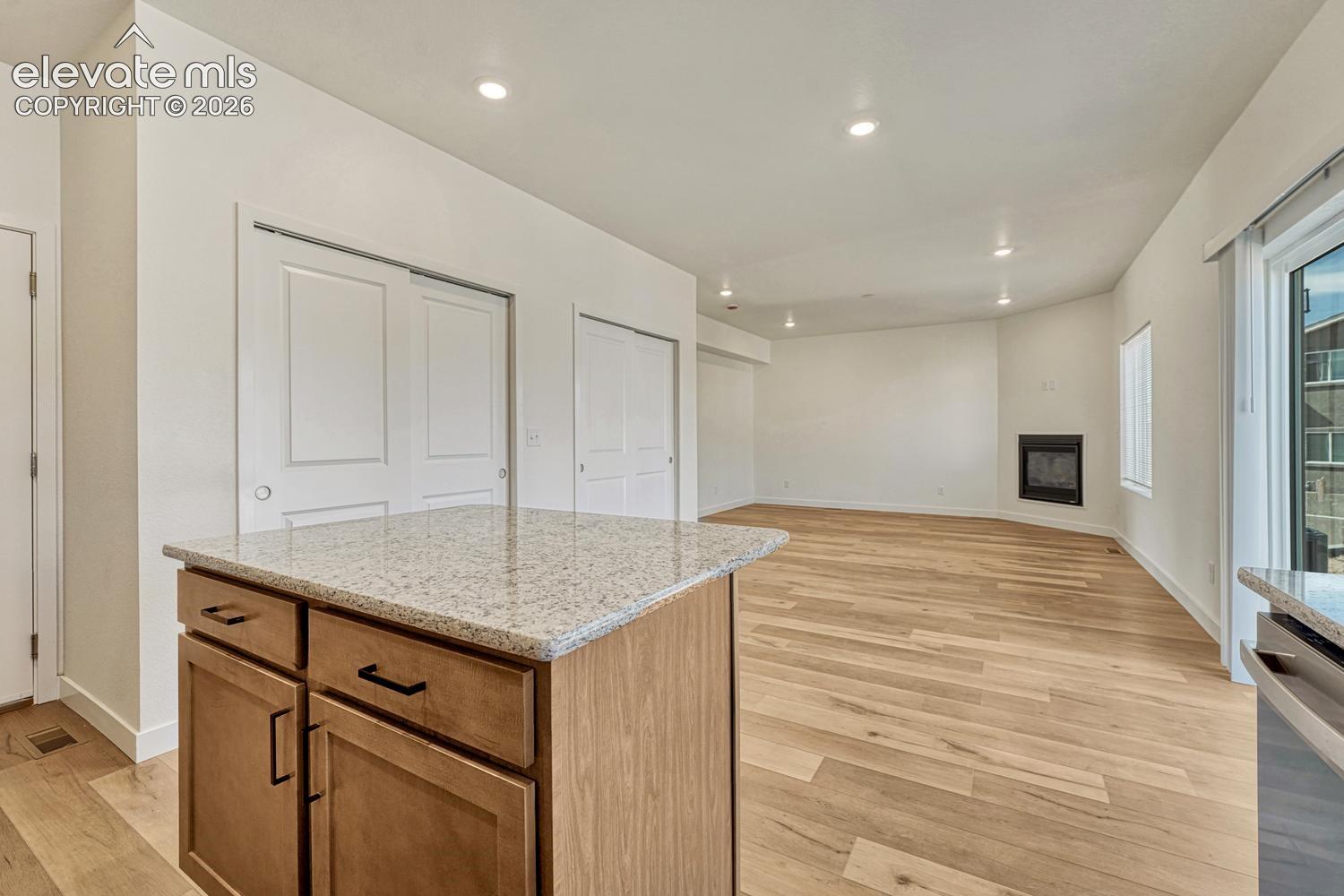 Attached two-car garage enters the kitchen