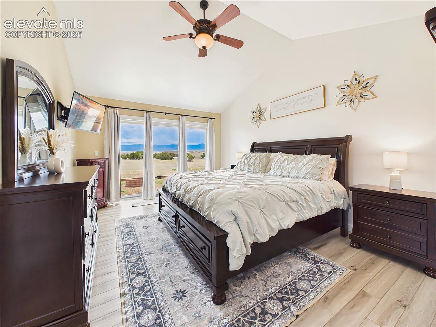 Large picture windows frame beautiful mountain and prairie views while filling the room with natural light.