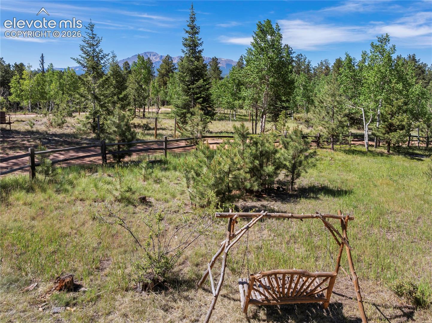 Come sit with me and feel the breeze surrounding Pikes Peak!