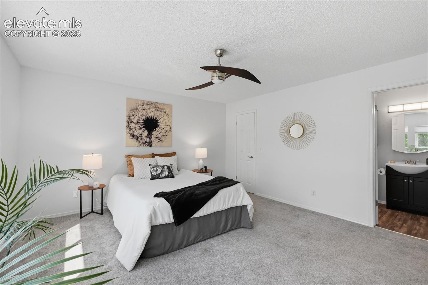 Primary bedroom with 3 closet for great storage access to bathroom