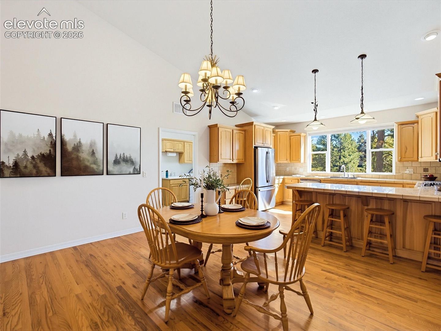 Large dining area adjacent to kitchen