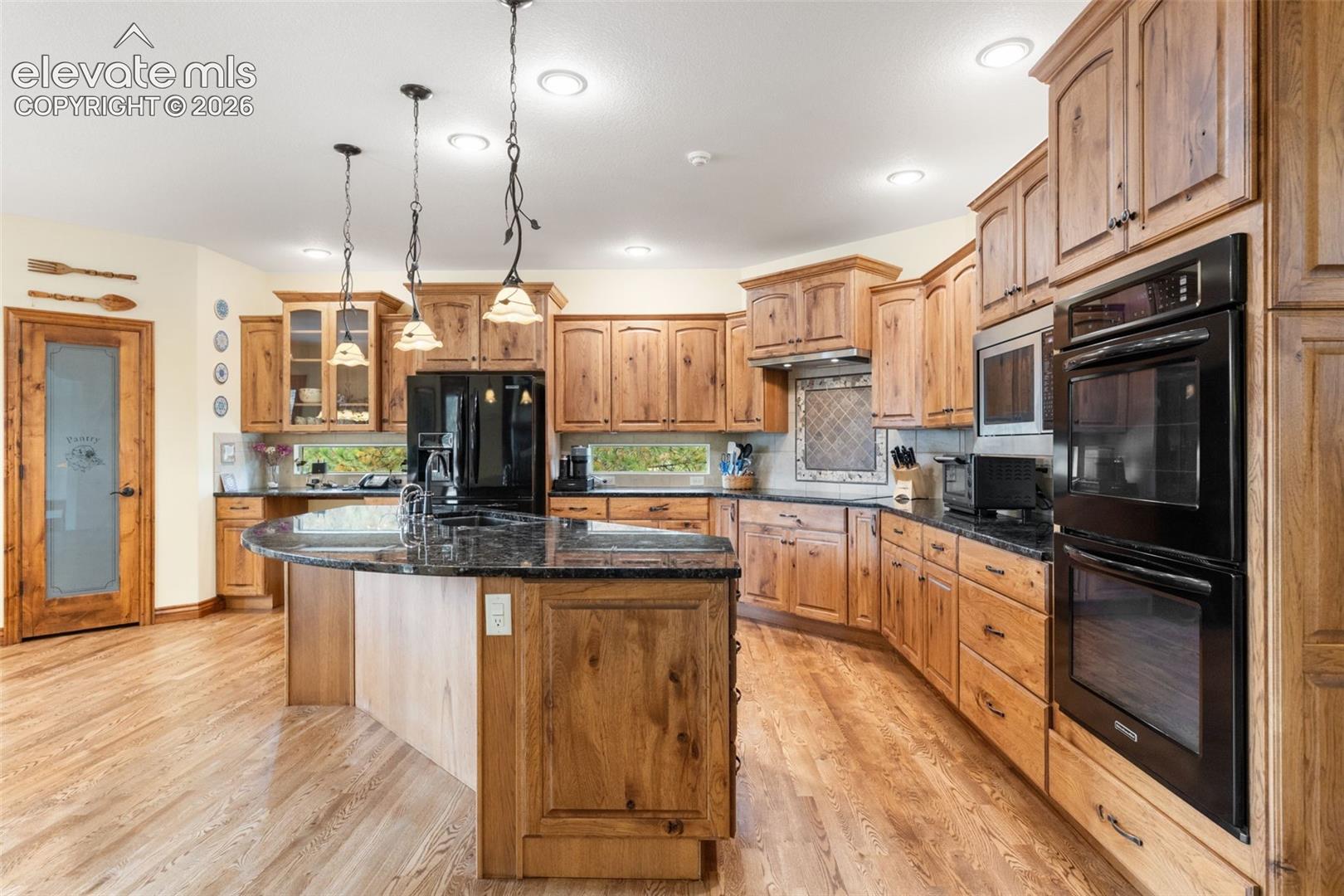 Kitchen and view of pantry