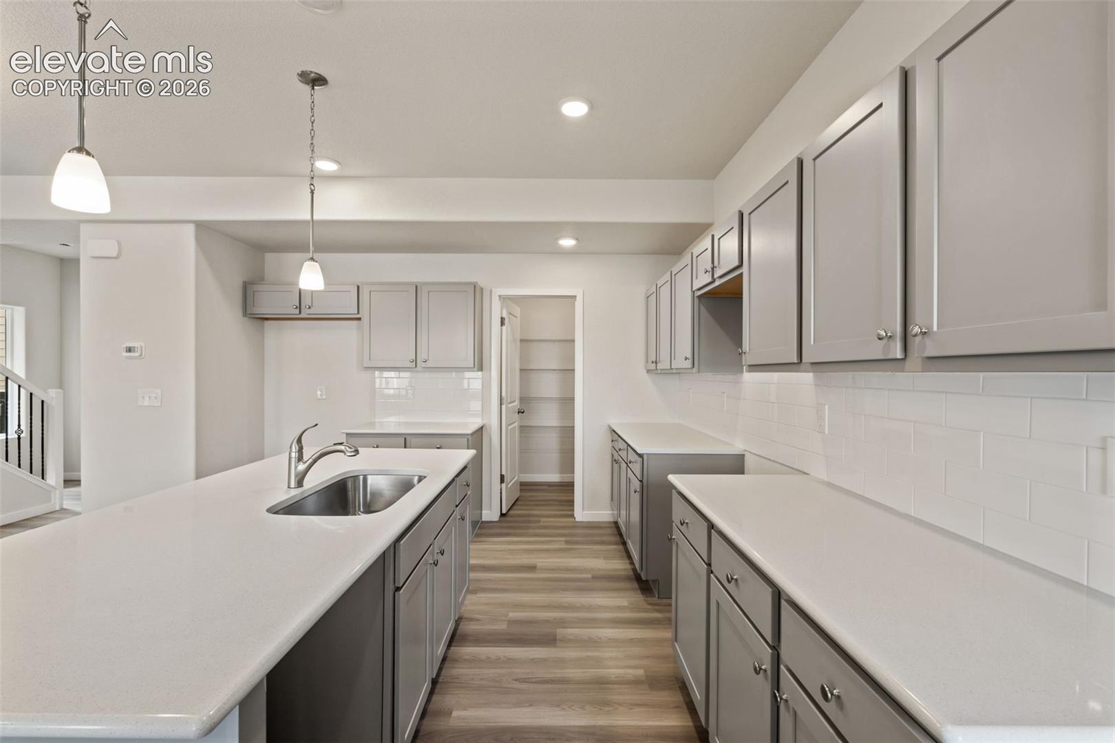 Photo is of a similar home. Actual home is under construction. Exterior colors, finishes, and features may vary.